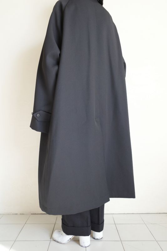 INTERIM インテリム PURE BLACK WOOL GABERDINE SINGLE RAGLAN COAT