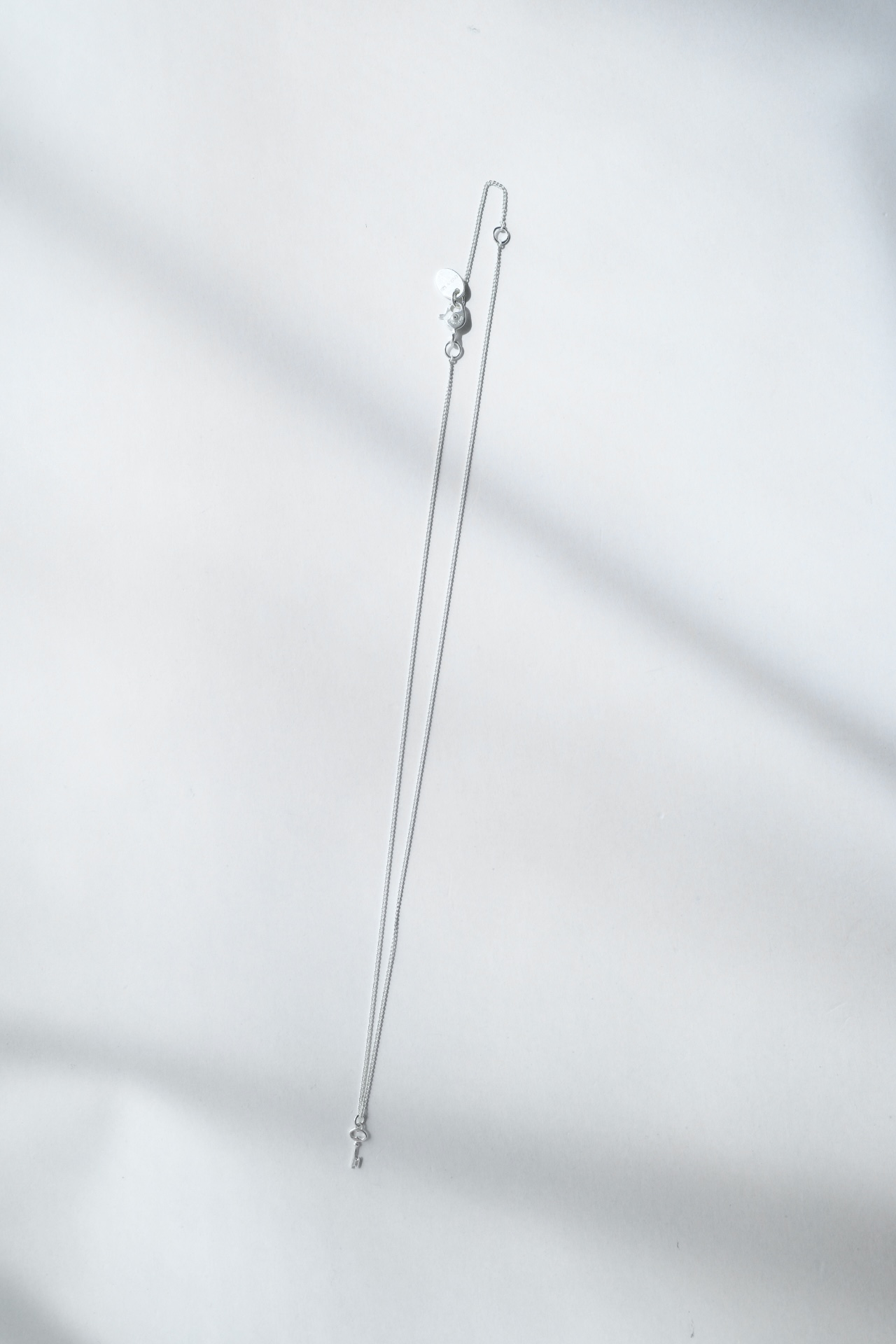 TAKAHIROMIYASHITATheSoloist. tiny key necklace.・silver - tity
